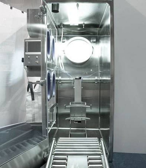 Drum tipper integrated within a dispensing isolator 2
